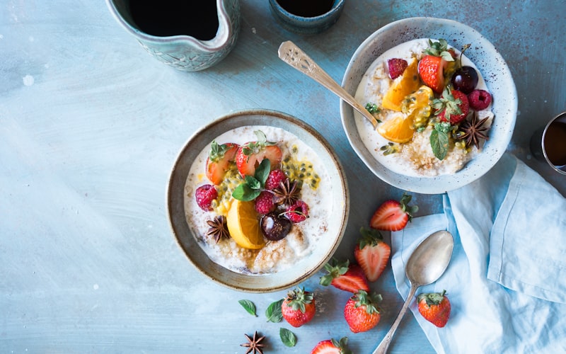 Bowls of oatmeal with fresh fruits